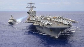 تحريك حاملة طائرات أمريكية وسفن حربية إلى مياه الخليج